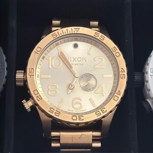 Nixon gold watch